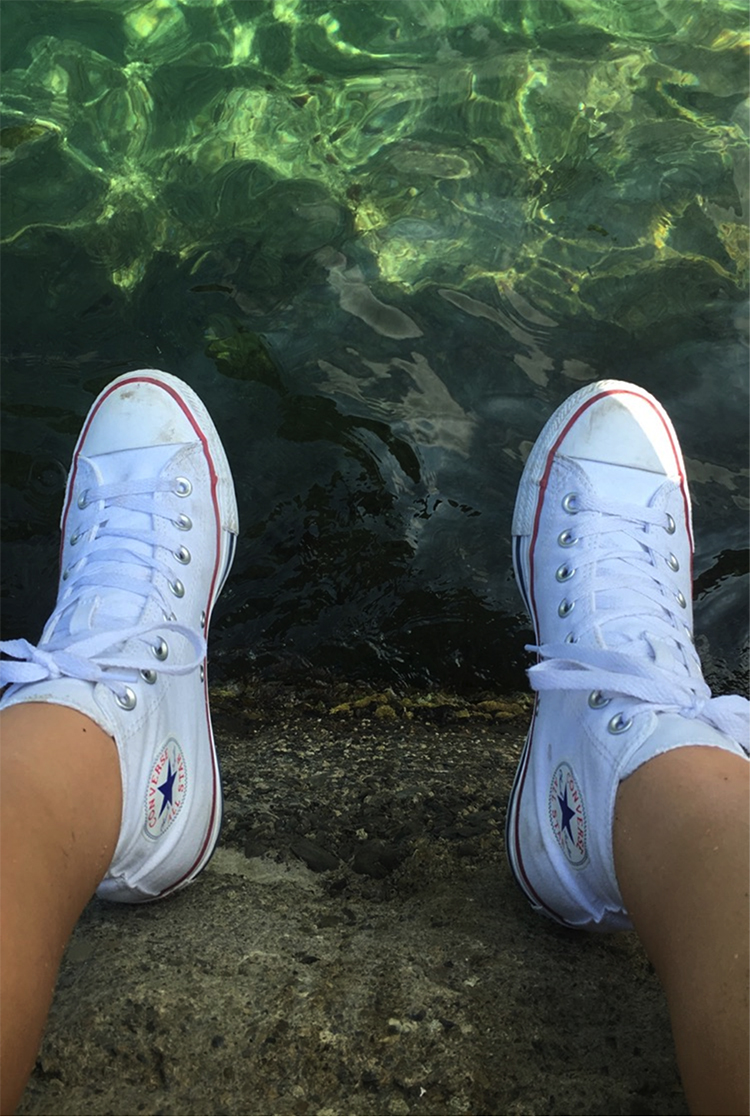 Relaxing on the pier at the Italian Riviera, Cinque Terre.